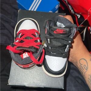 Nike Kids Black, White, and Red Sneakers